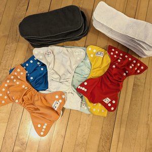 6 pocket diapers, 19 inserts, newborn <12lbs size